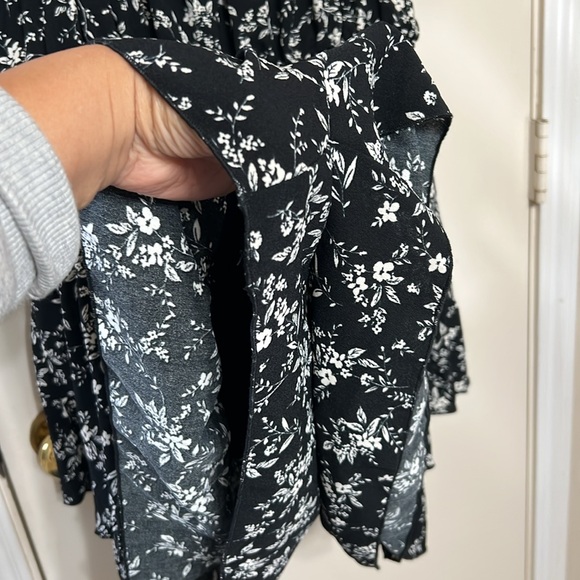 New with tags skort/dress. Sleeves can be used off the shoulder. - Picture 2 of 5